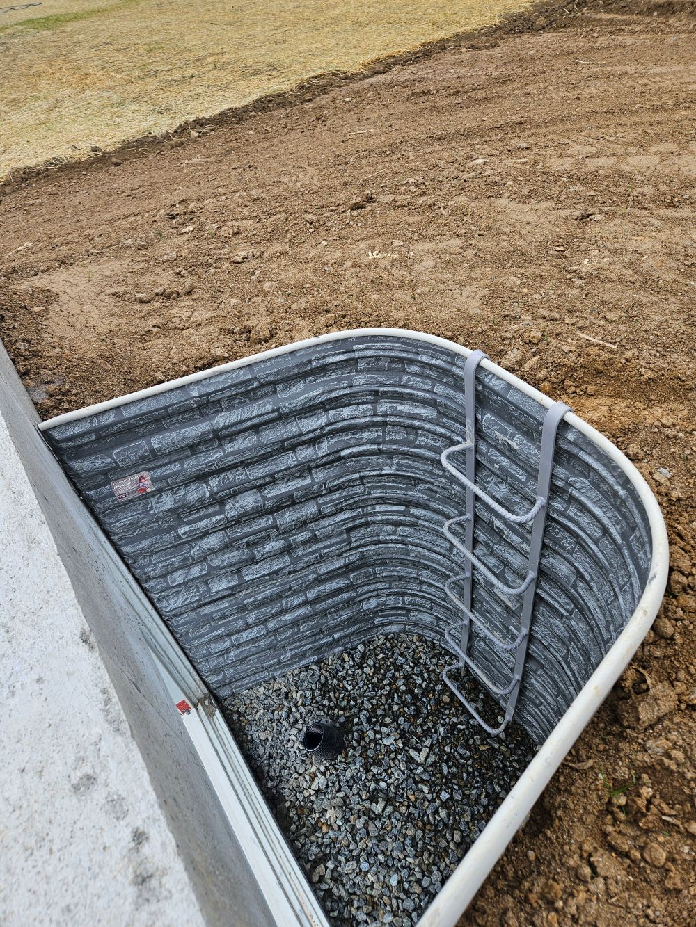 boman kemp stacked stone egress well