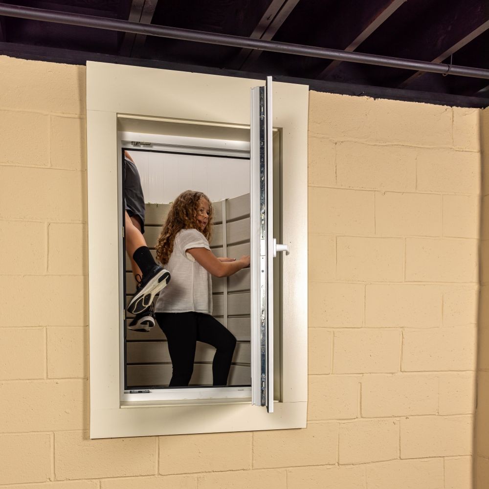 kids escaping through an egress window