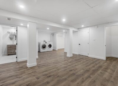 green remodeling basement with bathroom, washer and dryer, closet