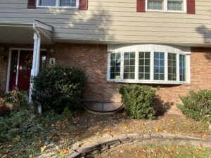 outdoor view of yard and window well waterproofing window wells egress solutions